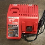 Milwaukee M12/M18 Battery Charger 48-59-1812 12V/18V Red. Fixed Price $20.00.