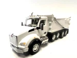 Dcp First Gear 1/64 Scale T-880 Kenworth Quad Axle Dump Truck, White. Fixed Price $73.15.