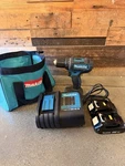 Makita XFD10 18V Cordless Drill Driver W / Charger, 2 Batteries & Bag. Fixed Price $135.00.