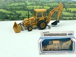 Vtg 1/32 Ertl #1456 Ford 555 Backhoe Loader Yellow Construction Die Cast In Box. Fixed Price $55.95.