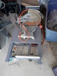 Ridgid Saw On Adjustable Portable With Wheels For Easy Cutting. Fixed Price $150.00.