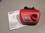 New Genuine Milwaukee 48-59-2401 M12 Lithium Ion Battery Charger Volt. Fixed Price $12.99.