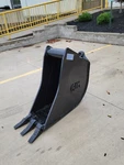 New 12" Wain Roy Style Backhoe Bucket To Fit 1/4 Yd.. Coupler. Fixed Price $1040.00.