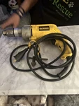 Dewalt Electric Drill Model DW245. Fixed Price $65.00.